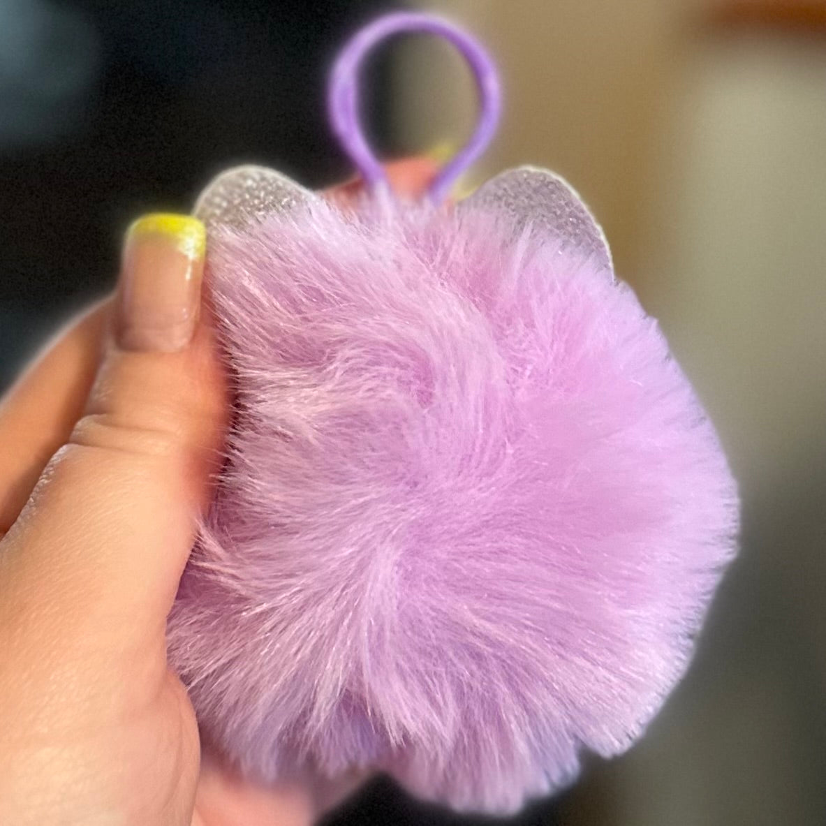 Fuzzy Puff Keychain with googly eyes and glasses
